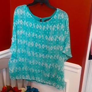 Turquoise and white short sleeve shirt